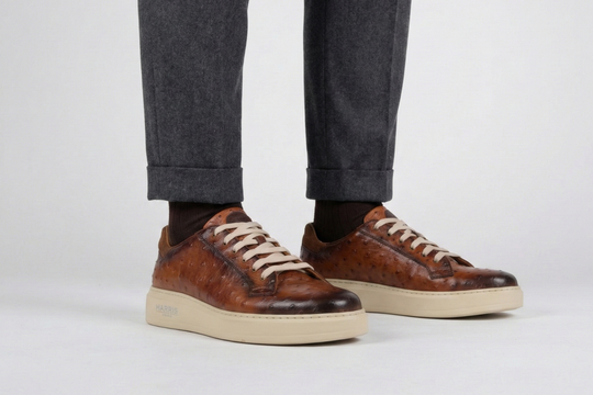 Sneakers in pelle stampata effetto struzzo