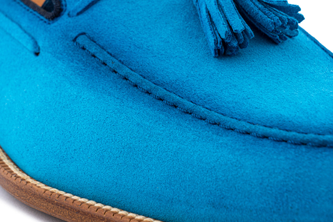 Mocassino in suede con pon pon