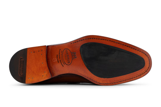 Mocassino in pelle dipinto a mano con pon pon