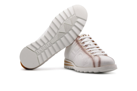 Sneaker de piel y ante decolorados.