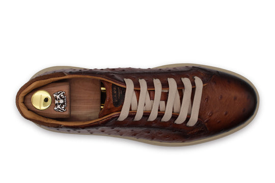 Sneakers in pelle stampata effetto struzzo