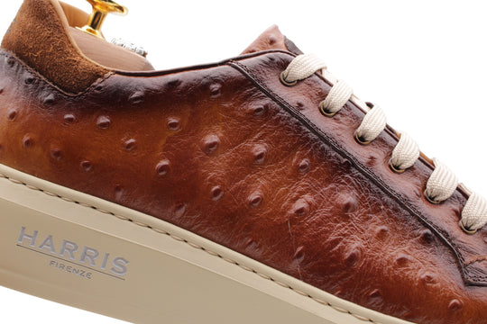 Sneakers in pelle stampata effetto struzzo