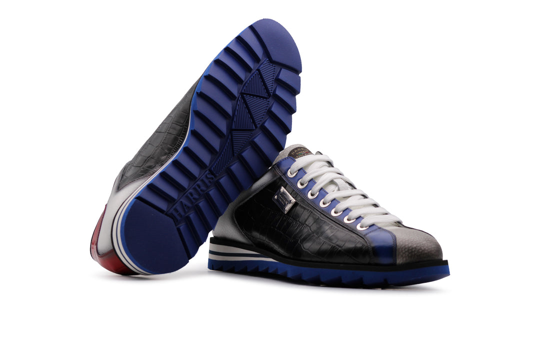 Sneakers effetto coccodrillo e dettagli sfumati