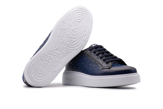 Sneakers in pelle stampata effetto struzzo