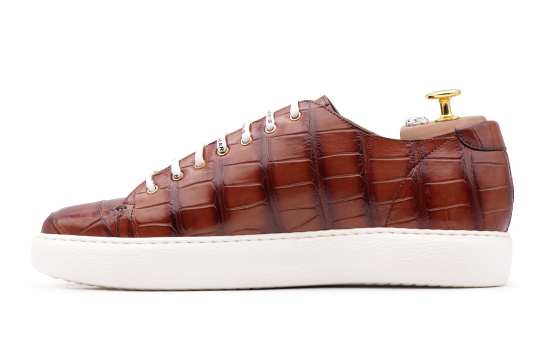 Sneakers in coccodrillo dipinte a mano